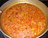A picture of step 4 of Sev tomato curry.