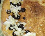 A picture of step 7 of Fluffy Cheese Omelette With Black olives 😋🥚🍽️.