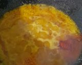 A picture of step 6 of Maacher Matha'r Ghonto/Fish Head Curry.