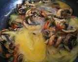 Foto del paso 5 de la receta Revuelto de champiñones y queso