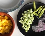 A picture of step 6 of Canned Tuna Ceviche with Mango, Cucumber, Red Onion, and Citrus Sauce.