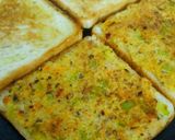A picture of step 6 of Cheesy veggie open sandwich toast.