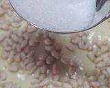 Foto del paso 12 de la receta: 179. Coca de San Juan de hojaldre, crema y piñones