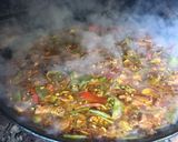 A picture of step 13 of Paella with Vegetables and Meat.