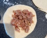 A picture of step 6 of Lebanese homemade meat pies/ Lahm bi Ajeen or Sfiha.