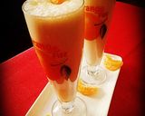 A picture of step 1 of Orange lassi.