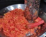 A picture of step 1 of Gajar ka halwa.