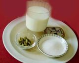 A picture of step 2 of Pall payasam with almond milk, rice dumplings, (Paal kozhukattai in Tamil).