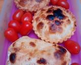 Foto del paso 6 de la receta: Tarteletas de cebolla, pimiento rojo y ajo salteado, con quesos varios