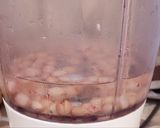 A picture of step 4 of Millet kunu with white rice,fresh groundnut and wheat.