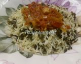 A picture of step 2 of Moringa rice with onion sauce.
