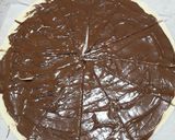 Foto del passaggio 2 della ricetta Cornetti pasta sfoglia alla nutella express