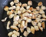 Foto del paso 4 de la receta Arroz caldoso con alcachofas, ajos tiernos y pollo