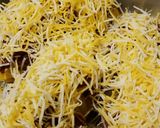A picture of step 6 of Chili cheese hassleback potatoes.