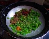 A picture of step 2 of Khamang Dhobli mirch.