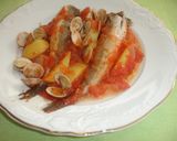 Foto del paso 7 de la receta Pescadilla con almejas al horno