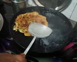 A picture of step 6 of Besan ka chilla.