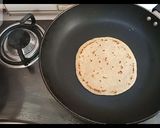 A picture of step 8 of Roti\Chapati \Phulka with liquid dough.