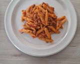 A picture of step 6 of Creamy Tomato Penne with Pork and Basil.