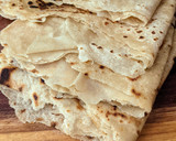 A picture of step 4 of Layered Chapatis with tea.