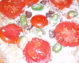صورة لخطوة 3 من وصفة بيتزا بالعيش 😁🍕❤️