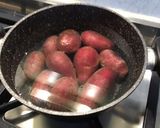 A picture of step 1 of Warm Potato and Asparagus Salad with Bacon, Tomatoes, and Sweet Onion.