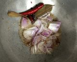 A picture of step 1 of Onion pulav (Sindhi bhugga Chawla).