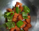 A picture of step 2 of Mix Spicy-Tangy Pickle.
