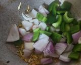 A picture of step 2 of Garlic Chicken with white sauce.
