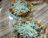 A picture of step 2 of Cheesy pizza shots.