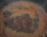 A picture of step 2 of Root beer bbq sauce.