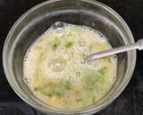 A picture of step 2 of Egg vegetable paniyaram.