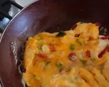 Foto del paso 3 de la receta: Huevo con tocino
