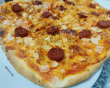 Foto del paso 5 de la receta: Pizza ibérica de chorizo y cebolla