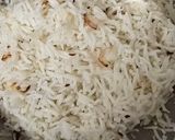 A picture of step 2 of Achari alu kadi rice.