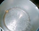 A picture of step 2 of Cardamom lemon green tea.