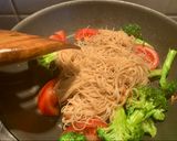 A picture of step 6 of Stir fried noodle with cheesy Tamagoyaki and grilled soysauce avocado.