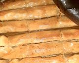 A picture of step 5 of Walnuts baklawa served with cream.