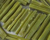 A picture of step 6 of Bharli Shevgyachya Shenganchi Bhaji (Stuffed Drumstick Fritters).