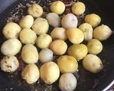 A picture of step 1 of Baby potatoes in coriander curry paste.