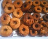 A picture of step 6 of Doughnut mai icing sugar.