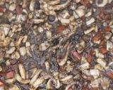 A picture of step 5 of Creamy black rice with squid and olive oil recipe.