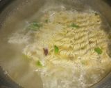 A picture of step 2 of Chicken noodle soup with egg.