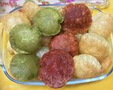 A picture of step 5 of Panipuri (7 types of water with 4 flavour  of  puries).