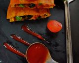 A picture of step 5 of Besan chilla sandwich.