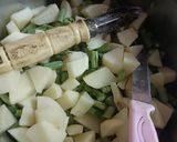 A picture of step 1 of Aloo beans.