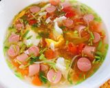 A picture of step 2 of Egg, Tomato, and Sausage Soup.