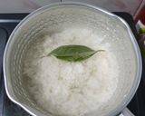 Foto langkah ke 1 dari resep Nasi tim ayam wortel.