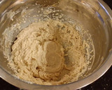 A picture of step 16 of Cinnamon Layer Cake with Whipped Cinnamon Cream Filling and Frosting.
