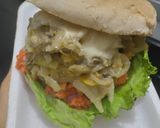 Foto del paso 11 de la receta: Sándwich con muchos vegetales y pollo🥙🥯🧅🍆🍗🥪